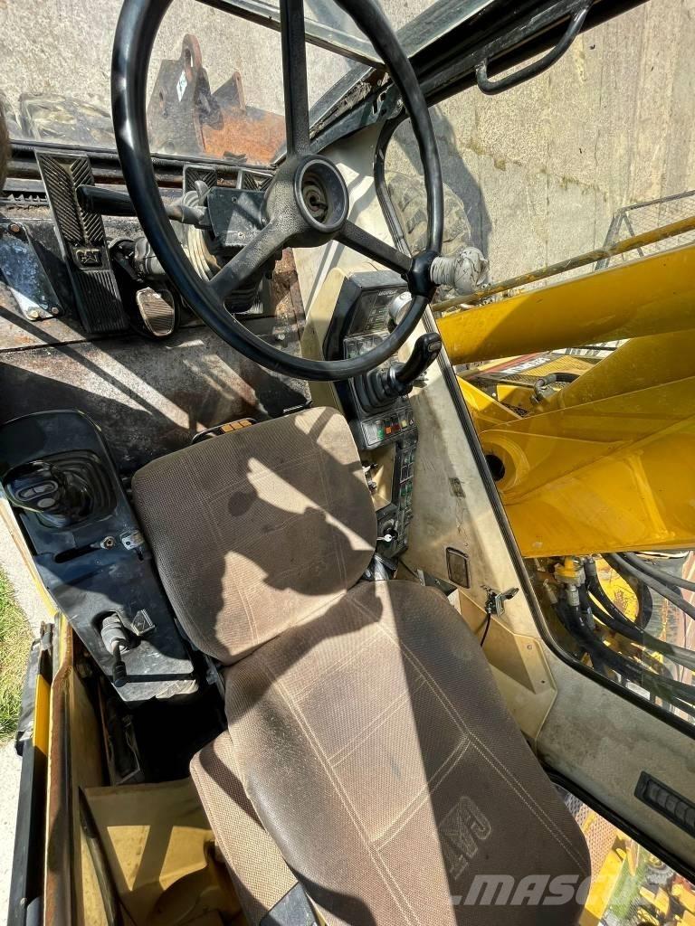CAT M 315 Gumikerekes kotrók