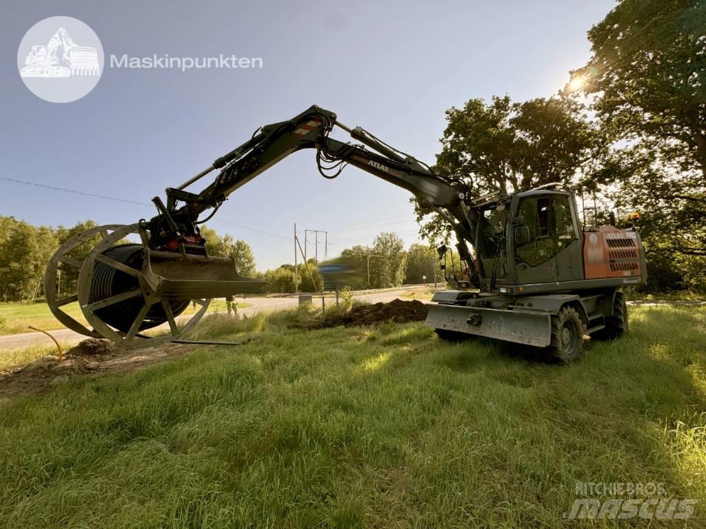 Atlas 160 W Gumikerekes kotrók
