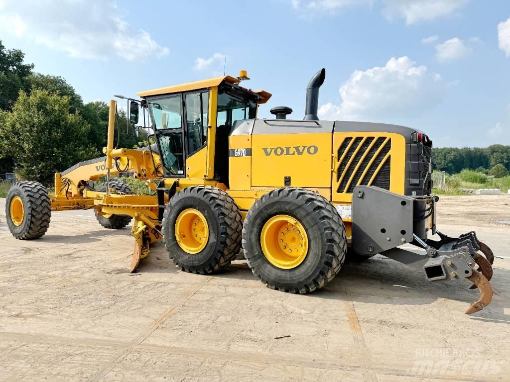 Volvo G970 + RIPPER Gréderek