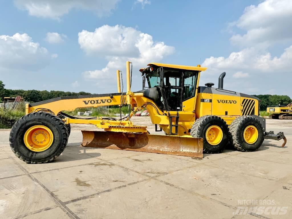 Volvo G970 + RIPPER Gréderek