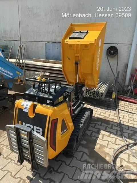 JCB HTD5 mit Tritt Mezei dömperek