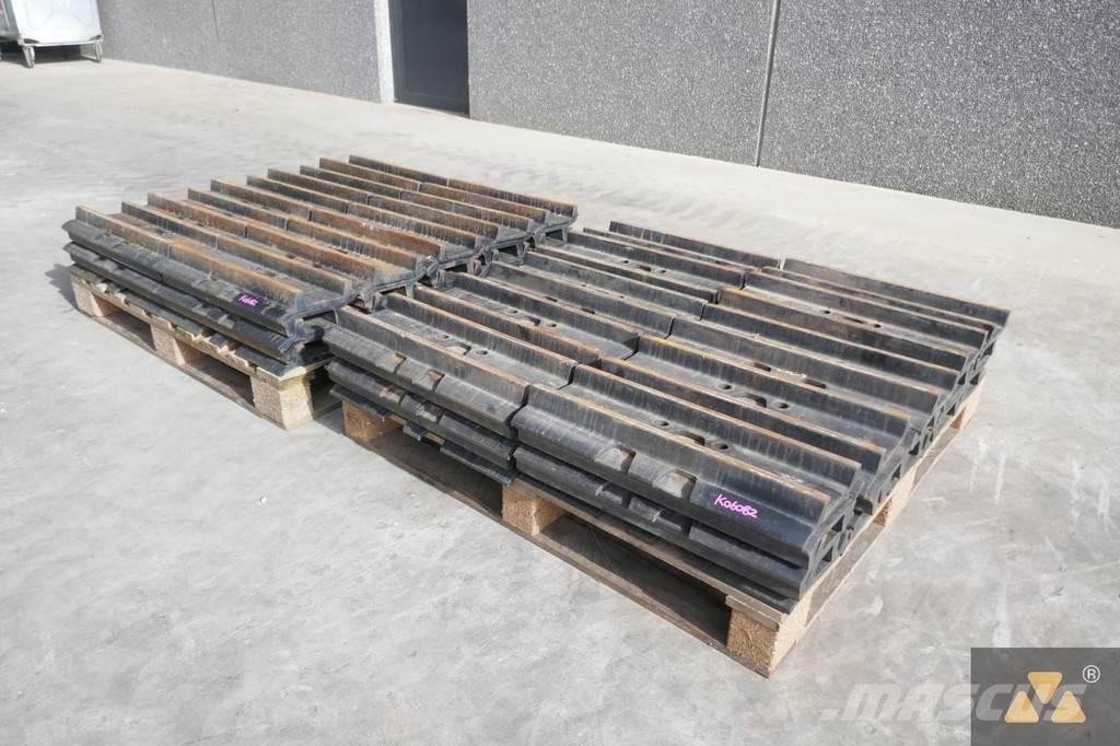 CAT 330 Trackshoes Gumiabroncsok, kerekek és felnik