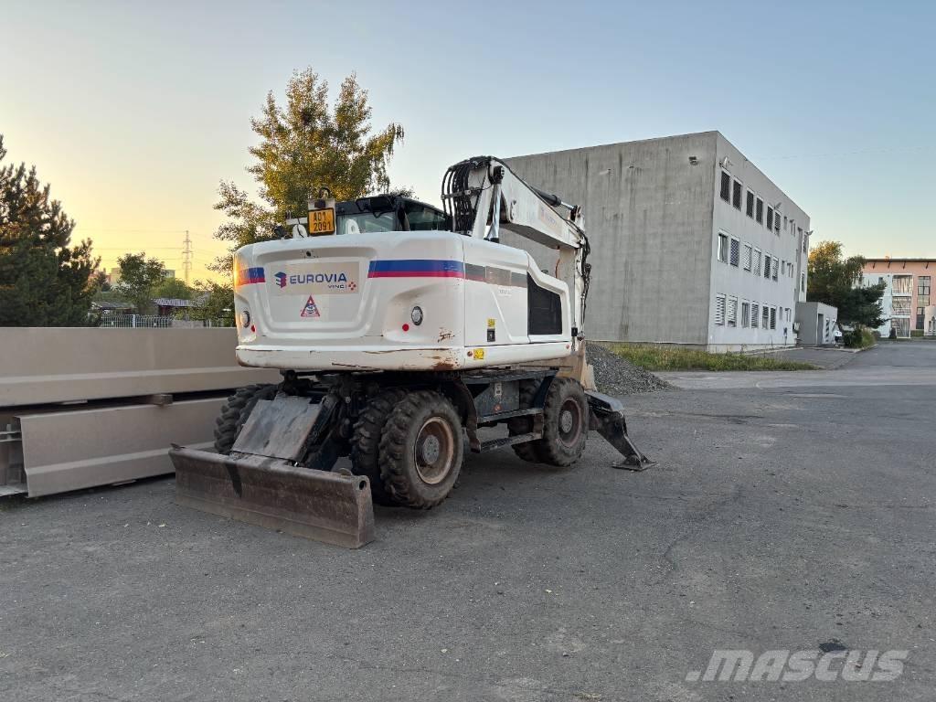 CAT m314f Gumikerekes kotrók