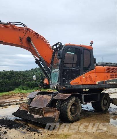 Doosan DX 210 W Gumikerekes kotrók