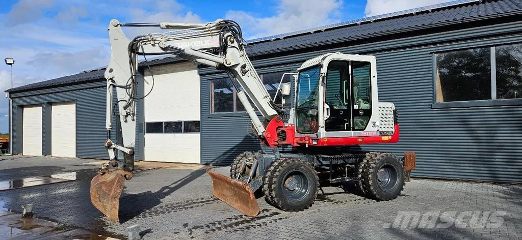 Takeuchi TB 175W Közepes (midi) kotrók 7 t - 12 t