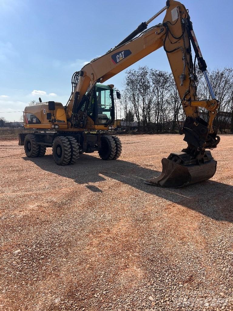 CAT 316D Gumikerekes kotrók