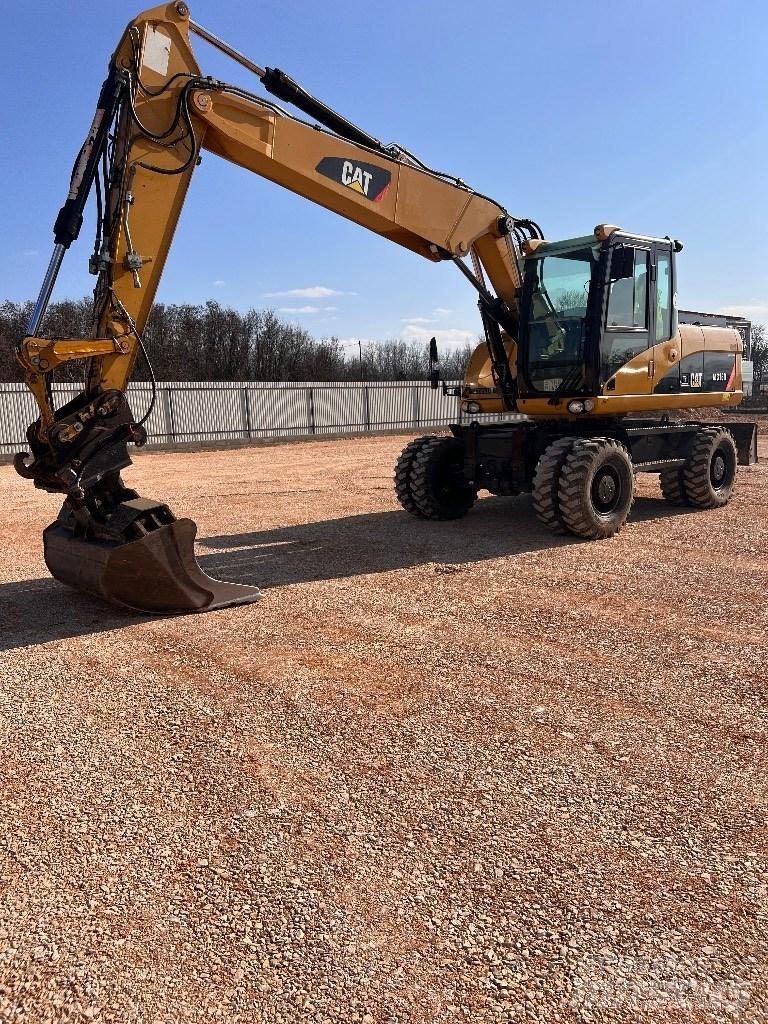 CAT 316D Gumikerekes kotrók