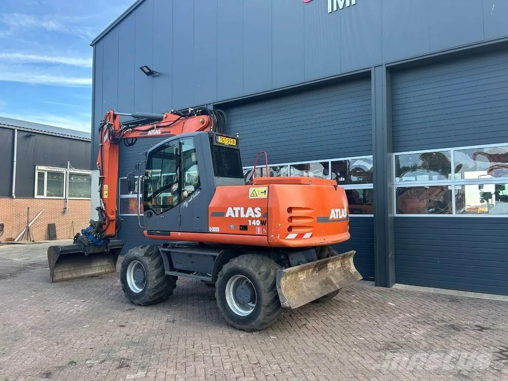 Atlas 140W Gumikerekes kotrók