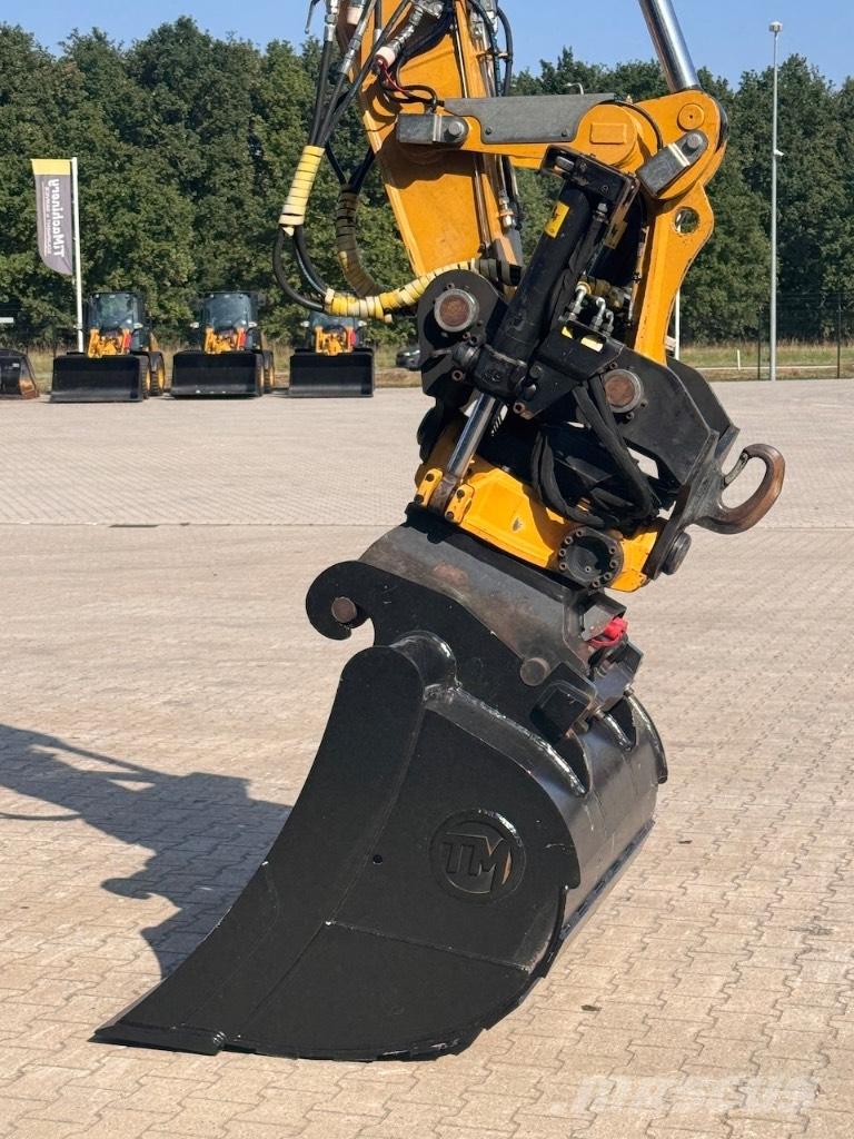 CAT M316F Gumikerekes kotrók