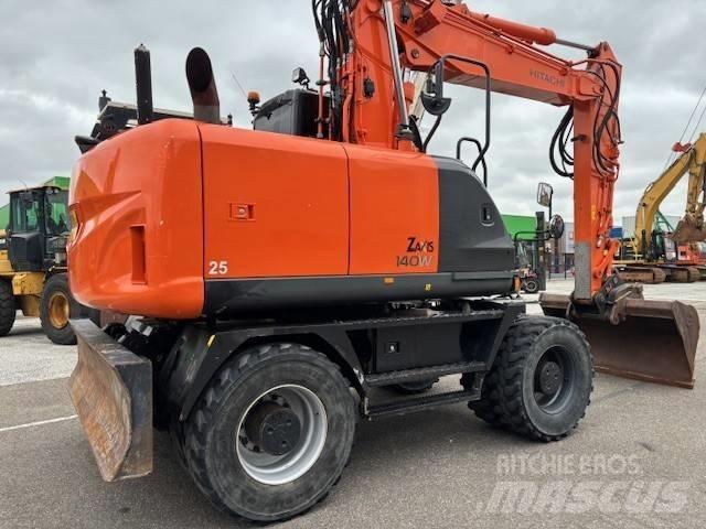 Hitachi ZX 140 W-5 Gumikerekes kotrók
