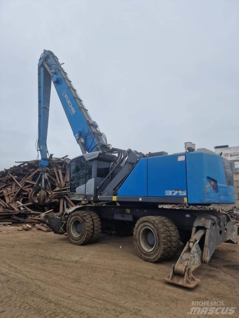Fuchs MHL 375 S5 Gumikerekes kotrók