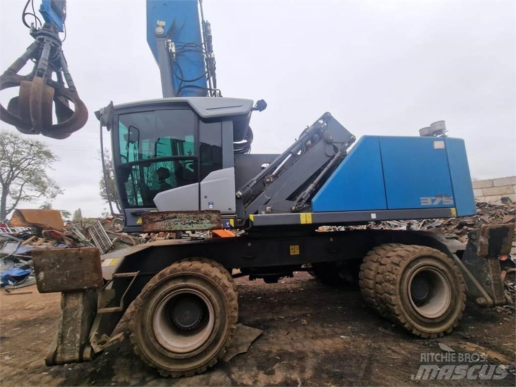 Fuchs MHL 375 S5 Gumikerekes kotrók