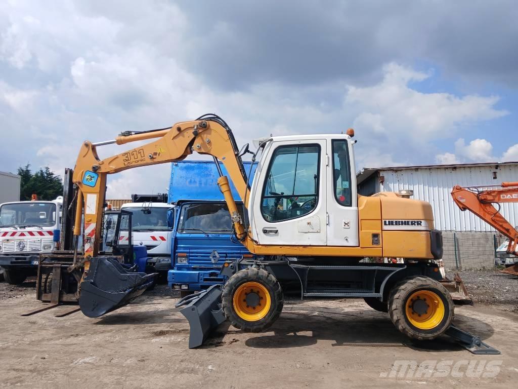 Liebherr A 311 Gumikerekes kotrók
