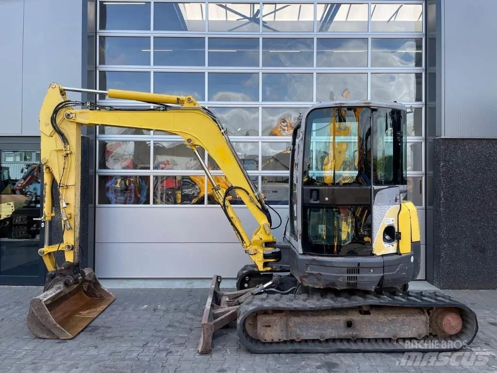 New Holland E50.2 Mini kotrók < 7t