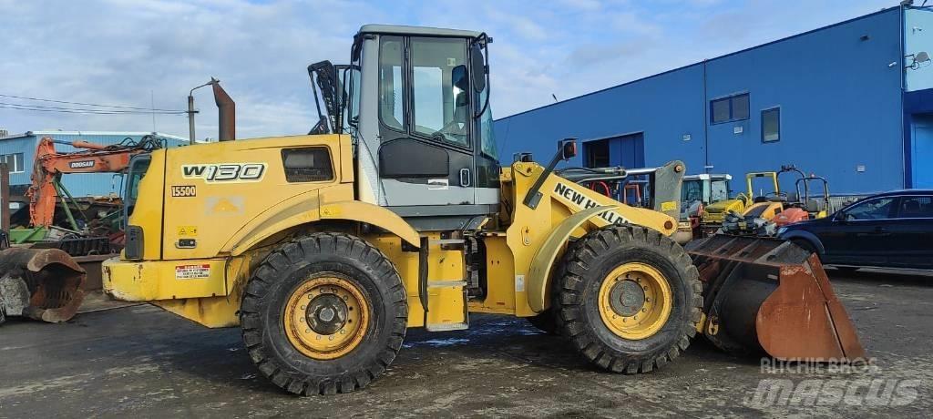 New Holland W 130 Gumikerekes homlokrakodók