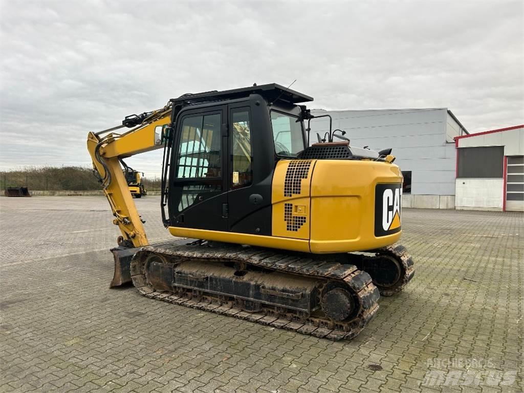 CAT 311 F L RR Gumikerekes kotrók