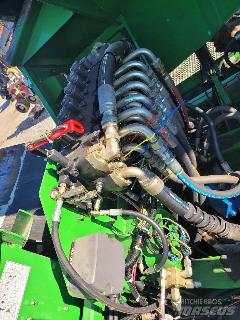 John Deere 853 Döntő-rakásolók