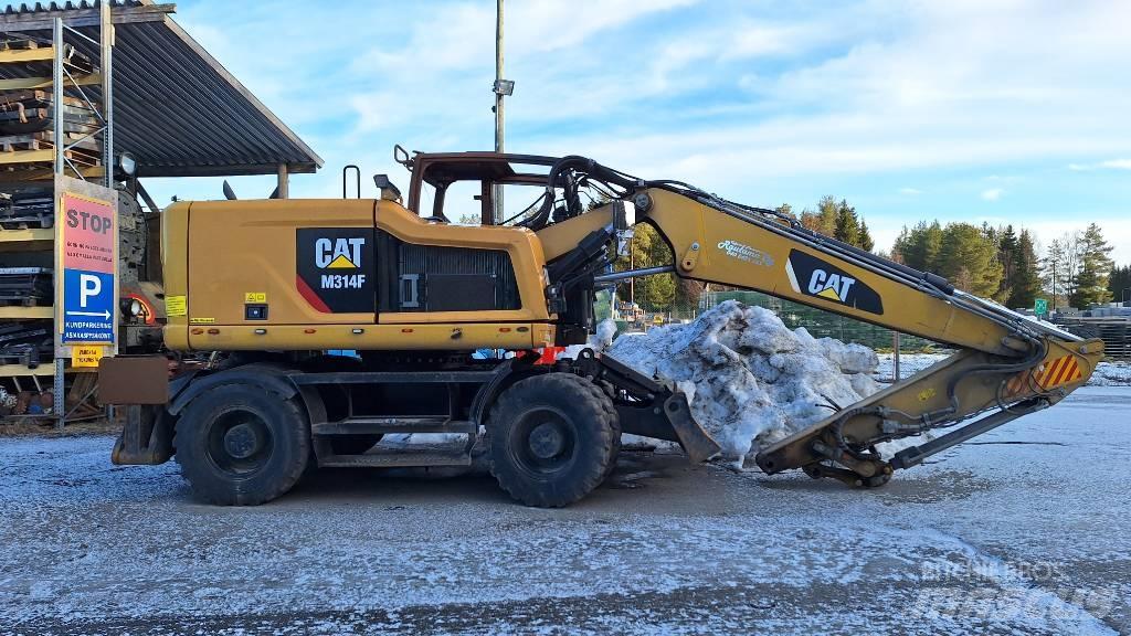CAT M314F Gumikerekes kotrók