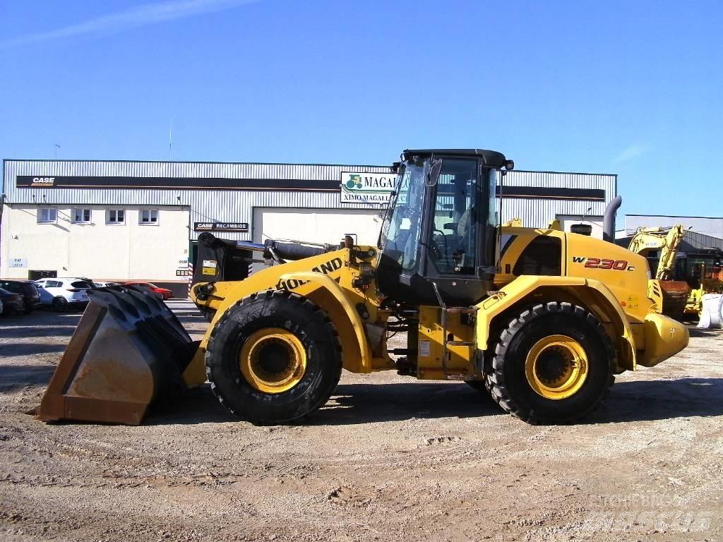 New Holland W 230 C Gumikerekes homlokrakodók