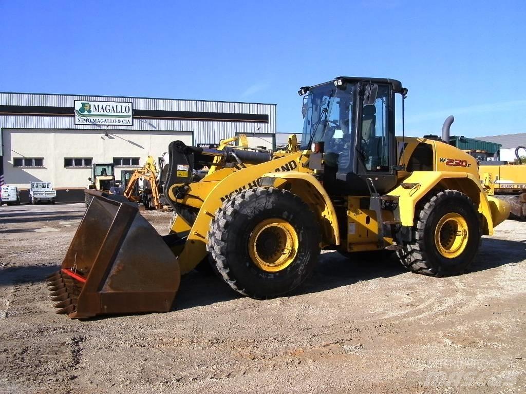 New Holland W 230 C Gumikerekes homlokrakodók