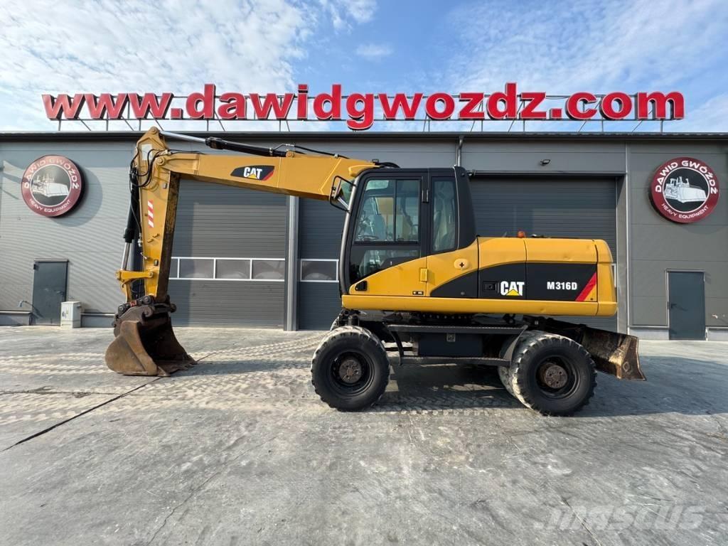 CAT M 316 D Gumikerekes kotrók