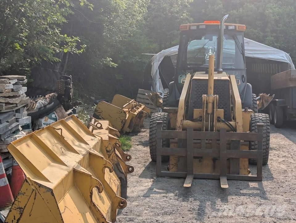 John Deere 310 SE Kotrórakodók