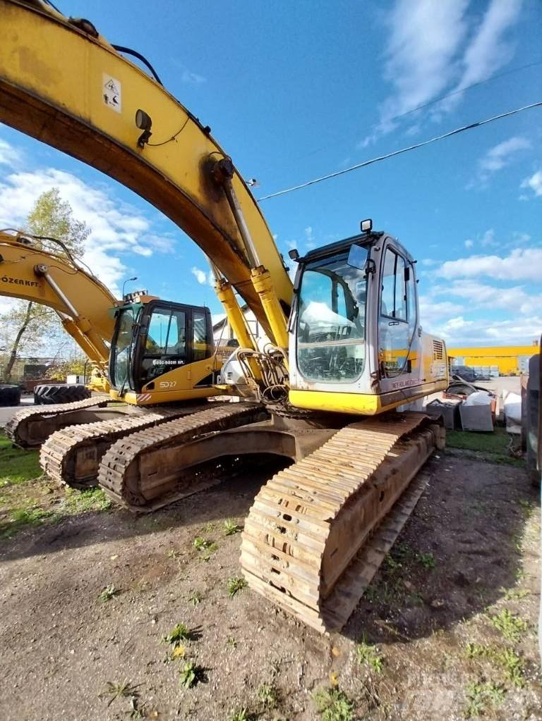 New Holland E 305 Lánctalpas kotrók