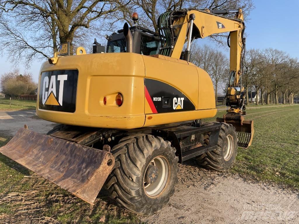 CAT M 313 D Gumikerekes kotrók