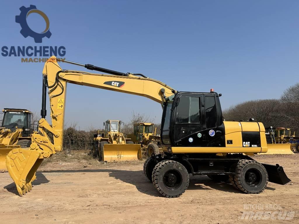 CAT M 320 D2 Gumikerekes kotrók