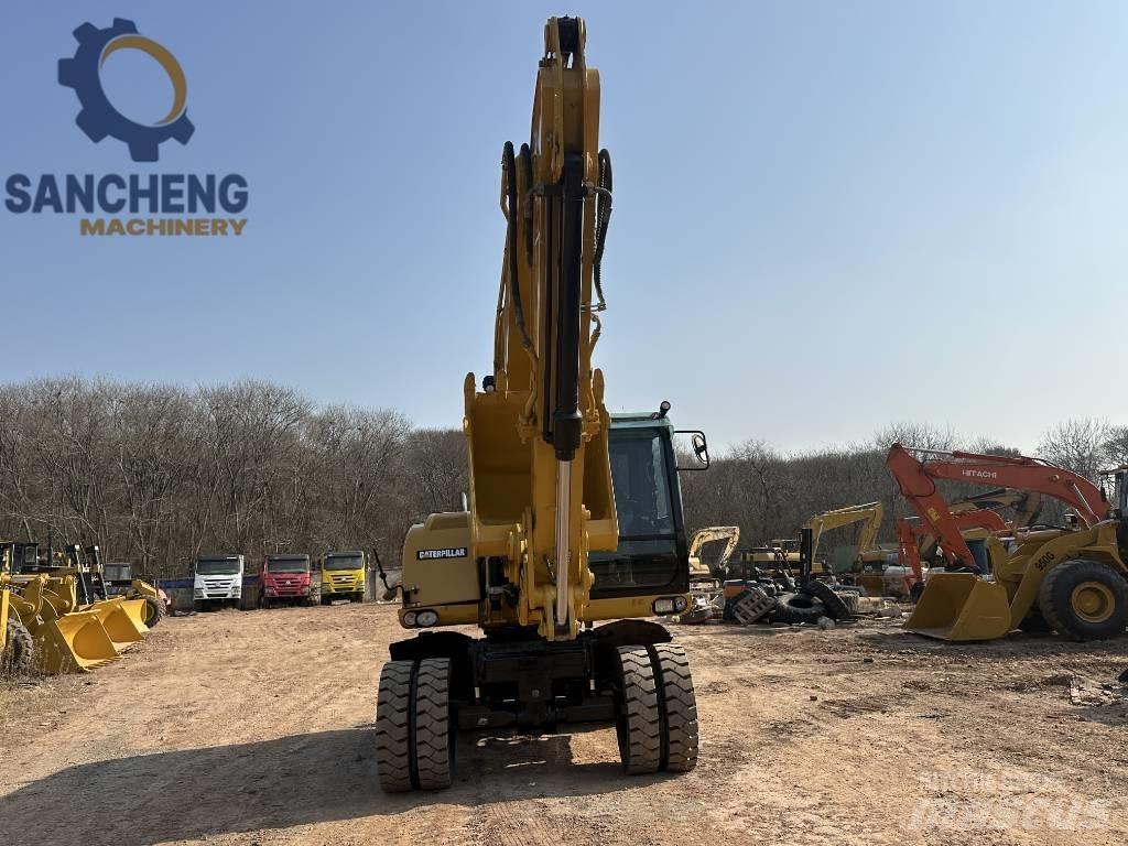 CAT M 320 D2 Gumikerekes kotrók