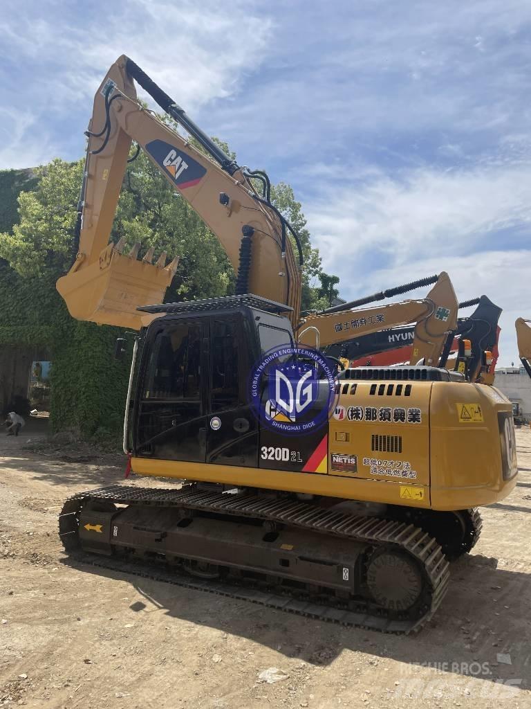 CAT CAT323 Lánctalpas kotrók