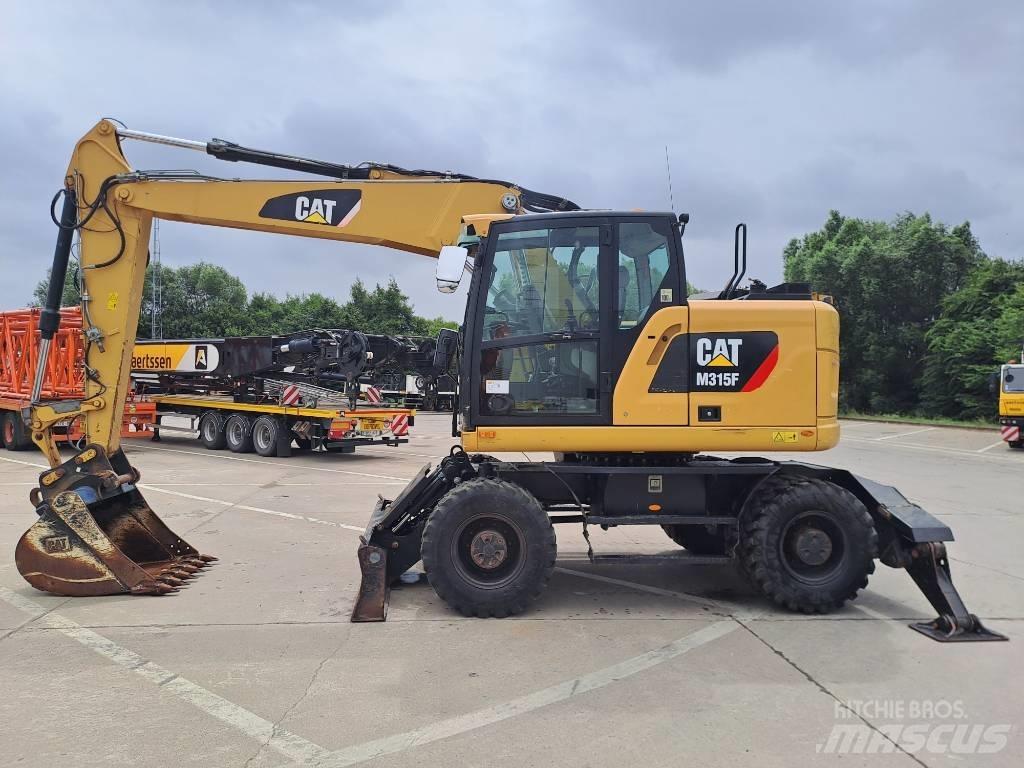 CAT M315F Gumikerekes kotrók