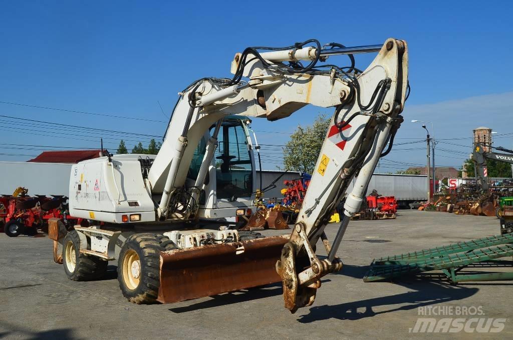 CASE WX 145 Gumikerekes kotrók