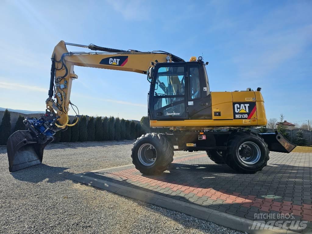 CAT 313 D Gumikerekes kotrók