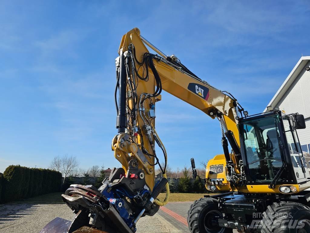 CAT 313 D Gumikerekes kotrók