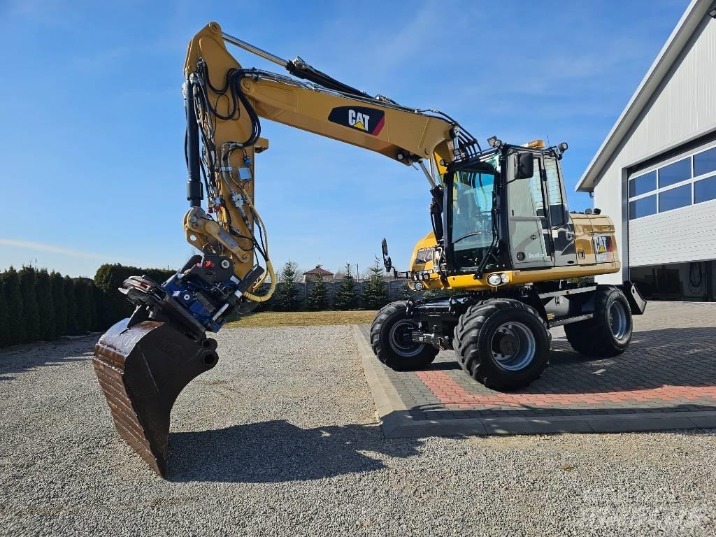 CAT M 313 D Gumikerekes kotrók