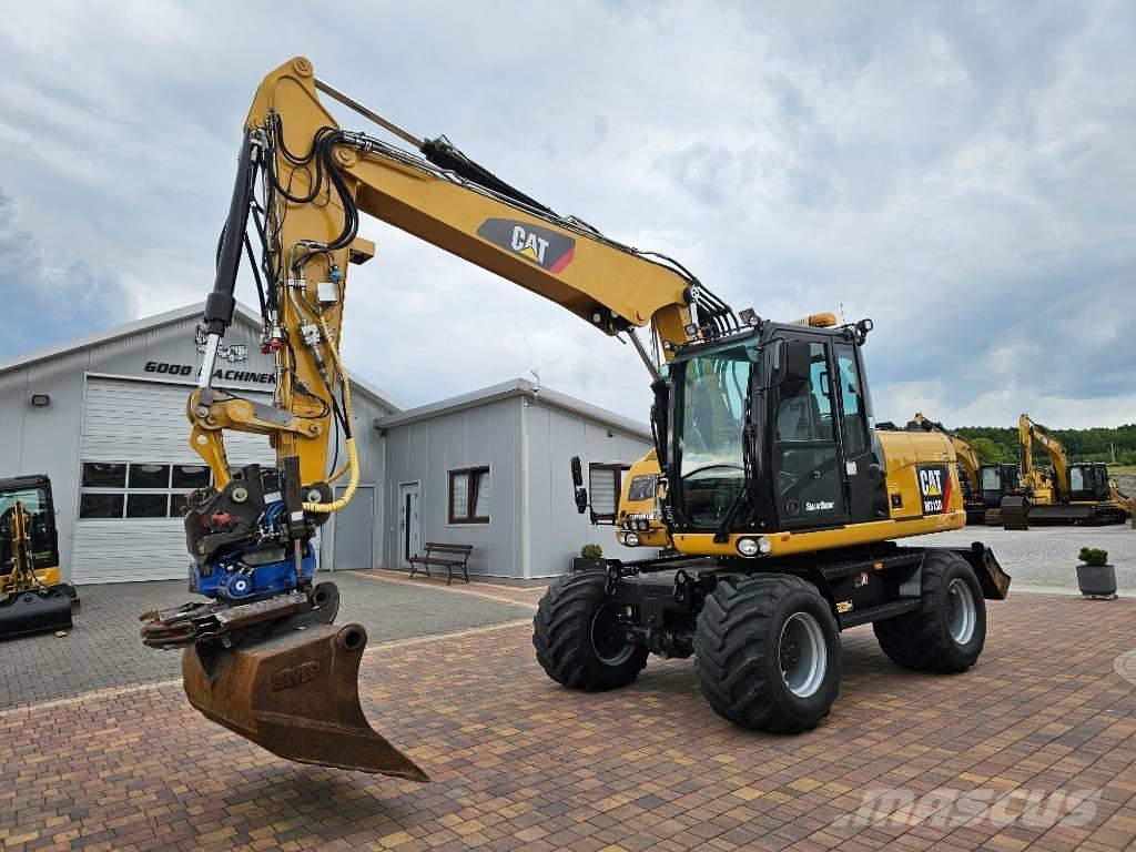 CAT M 313 D Gumikerekes kotrók
