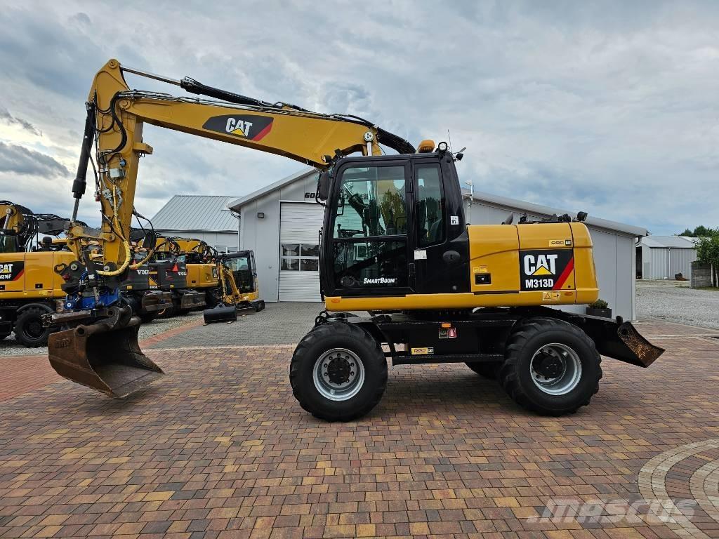 CAT M 313 D Gumikerekes kotrók