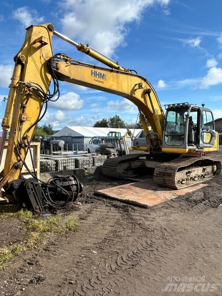 New Holland E 265 Lánctalpas kotrók