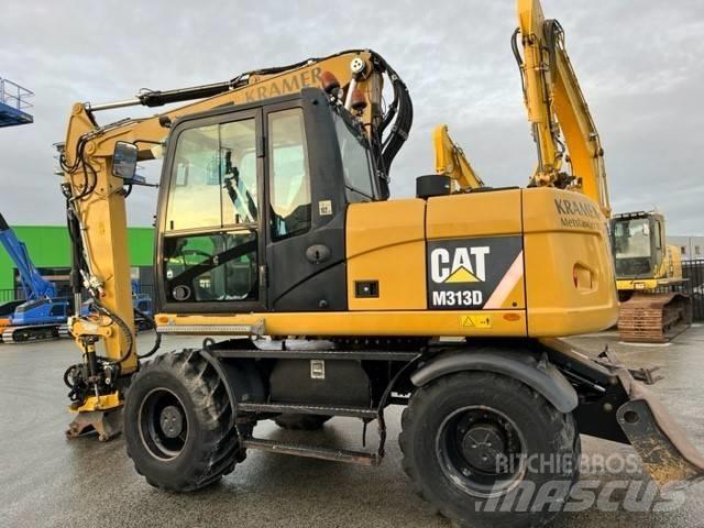 CAT M 313 D Gumikerekes kotrók