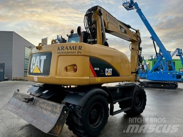 CAT M 313 D Gumikerekes kotrók