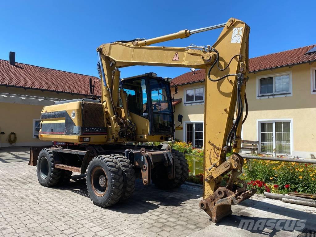 CAT M 312 Gumikerekes kotrók