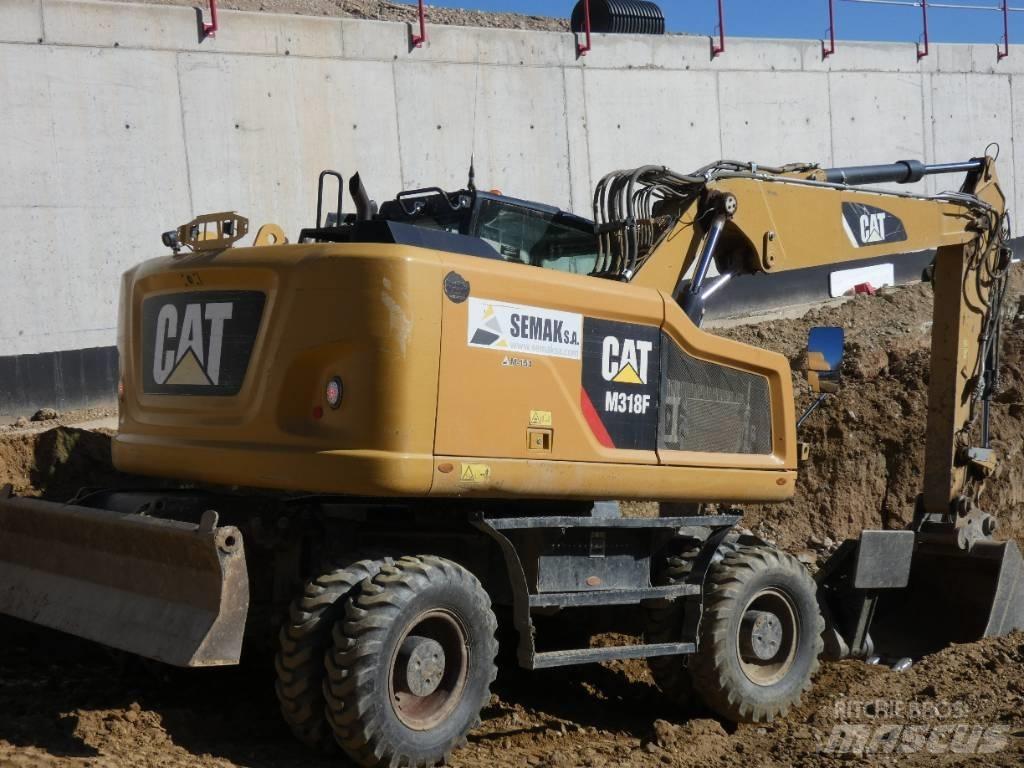 CAT M 318 F Gumikerekes kotrók