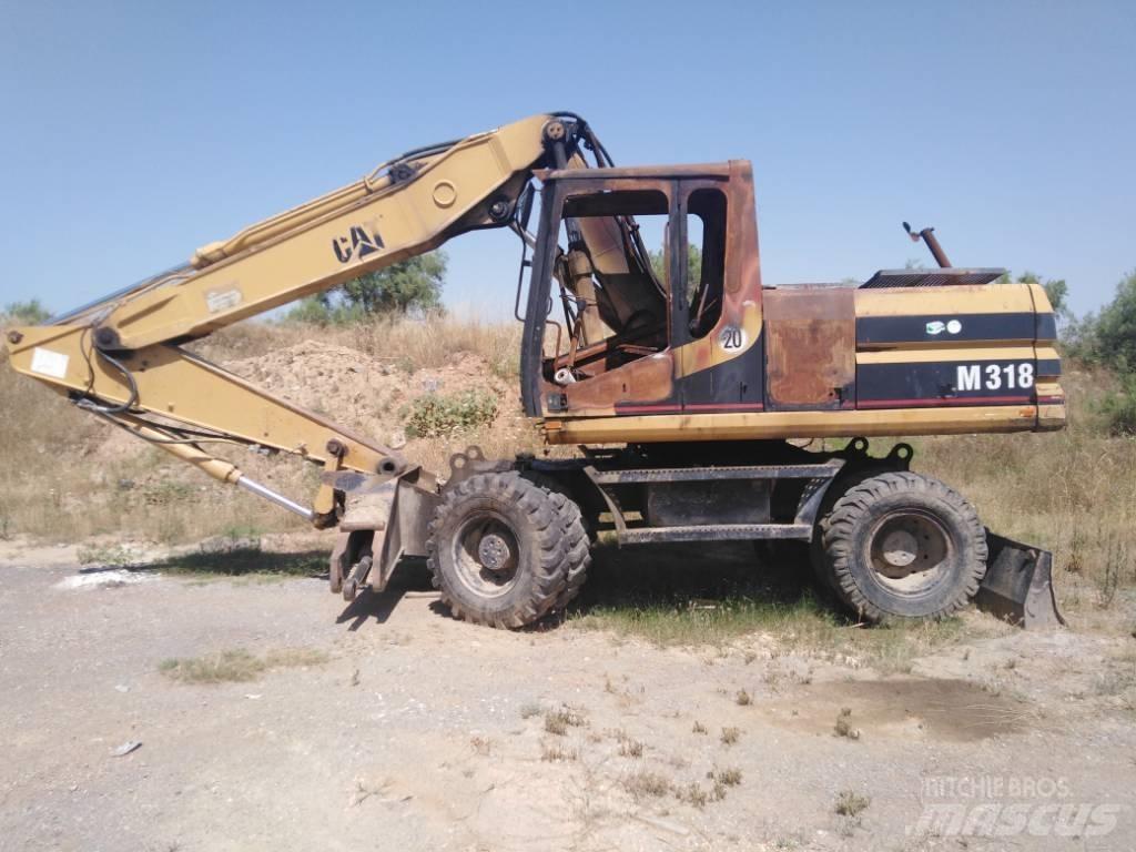 CAT M318 parts M 318 Gumikerekes kotrók
