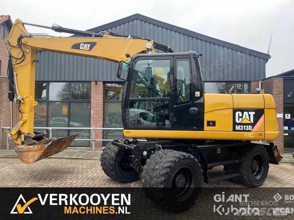 CAT M313D Gumikerekes kotrók