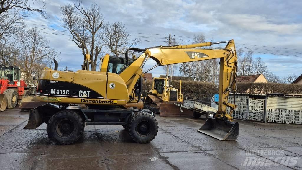 CAT M 315 C Gumikerekes kotrók