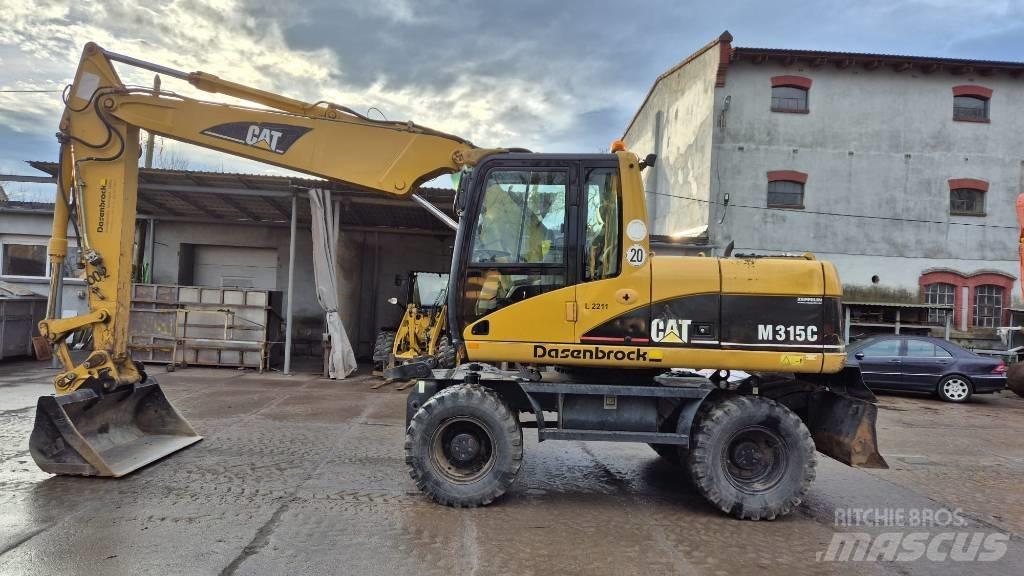 CAT M 315 C Gumikerekes kotrók
