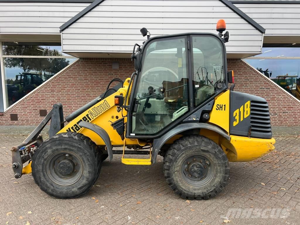 Kramer 318 Gumikerekes homlokrakodók