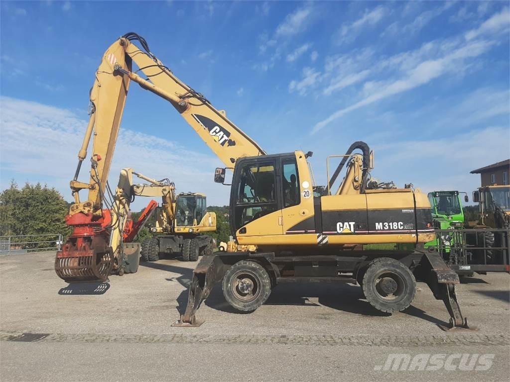 CAT M318C MH Gumikerekes kotrók