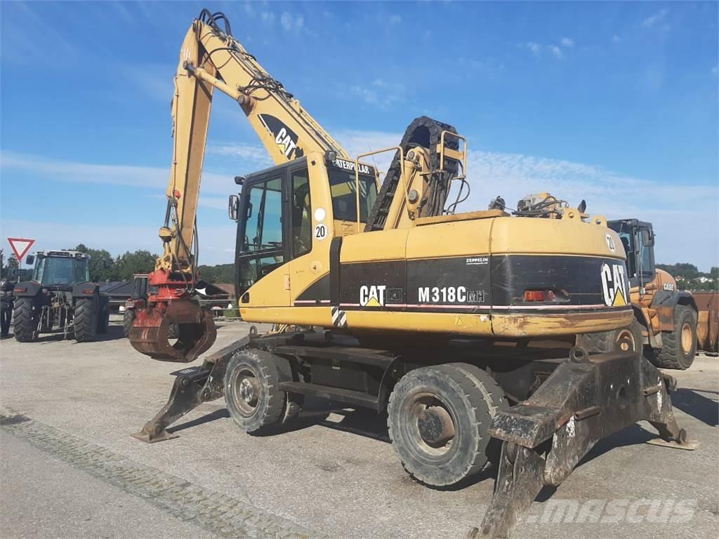 CAT M318C MH Gumikerekes kotrók
